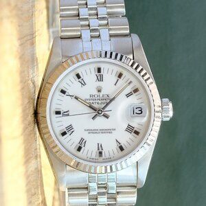ROLEX DATEJUST LADIES WATCH 31 MM WHITE ROMAN DIAL STEEL FLUTED JUBILEE 68274